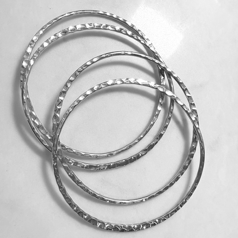 Set of 4 Silver Hammered Bangles New Condition with Gift Box